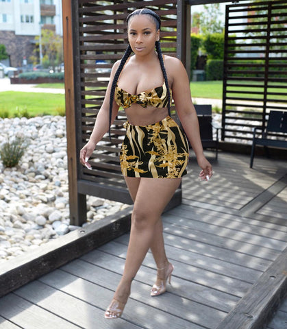 gold and black women skirt set