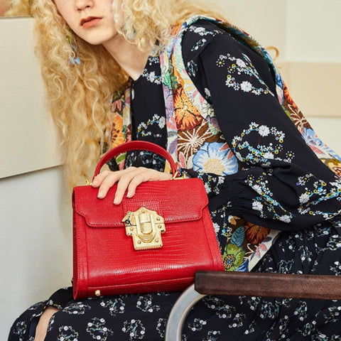 Serpentine Lock Handbag