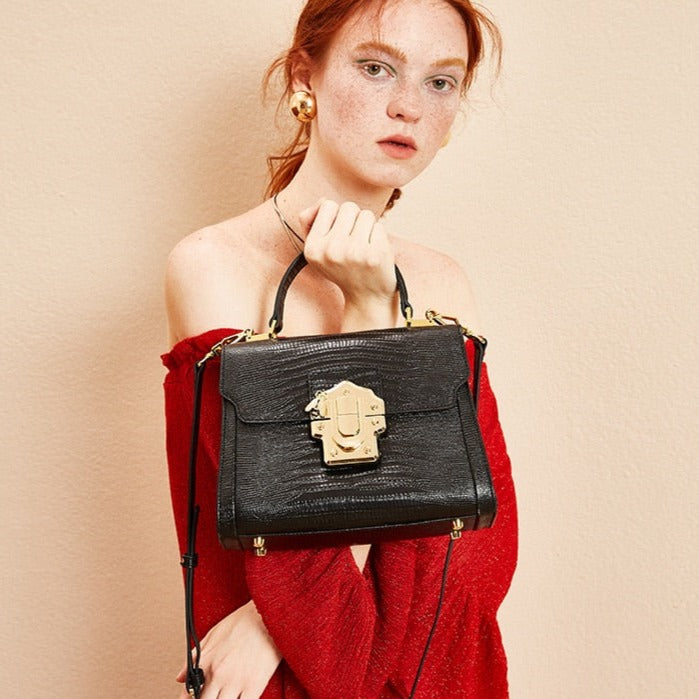 Serpentine Lock Handbag