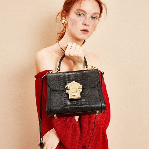 Serpentine Lock Handbag